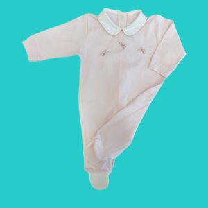 Pink baby onesie with white Peter Pan collar, laid flat on a turquoise background, partial view displayed as a clothing item mockup.