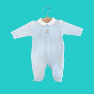 Light blue baby onesie on a wooden hanger with a white collar, set against a teal background with a small rocking horse embroidery at chest level.